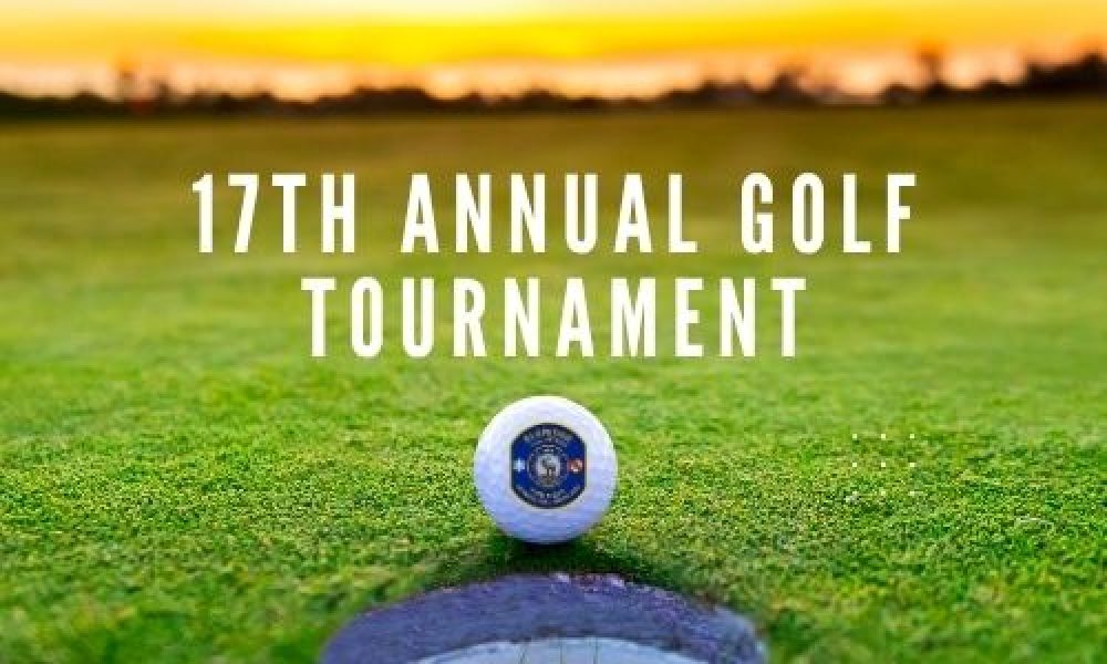 A golf ball sits near a hole on a green field at sunset, with the text "17th Annual Golf Tournament" displayed in bold white letters above.